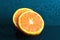 Still life Orange slice fruit on dark blue background. mandarins