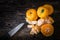 Still life oranges fruit and knife on texture wood.