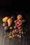 still life with organic autumnal fruits and walnuts