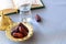 Still life Organic dates, cup of pure drinking water and quran book. Iftar Ramadan concept. Selective focus. Copy space