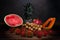 Still life photography of a pile of Thai fruit on the wooden tab