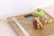 Still Life photography with two apples, tape mesaure and a scale