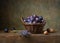 Still life with plums