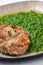 still life of pork cutlet with spinach