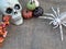 A still life presentation of a skull, spider and Autumn leaves