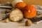 Still life with pumpkin, wooden ring and nuts