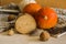 Still life with pumpkin, wooden ring and nuts