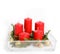 Still life with red candles, golden balls and ribbons, fir branches in glassware on a white background, Christmas