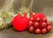 Still life from Red New Year\'s ball, decorative berries and tinsel