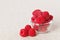 Still life with red raspberry and glass bowl