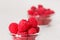 Still life with red raspberry and glass bowl