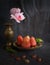 Still life rose apple, Orchid and Burning leaves in concept nat