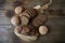 Still life with rye bread with sesame seeds and buns white bread on a wooden rustic background, top view, flat lay