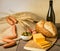 Still life with sausage cheese and bread