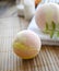 Still life spa resort treatment with bath bombs and towel on wooden background.