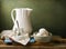 Still life with white pitcher and eggs