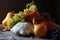 Still life with zucchini, pumpkin, squash and grape.