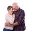 Still so in love. Studio shot of an affectionate elderly couple isolated on white.