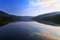 Still and peaceful evening light reflected in Tallybont