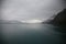 Still and serene grey winter morning on Lake Wakatipu, New Zealand