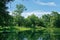 Still waters of the Concord River on summer morning