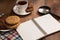 Stilllife with a notebook on the wooden table