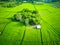 Stilt house on the rice terraced field with the mountains and clouds,