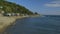 Stilt houses along the coastal beach, Moresby