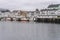 Stilt houses on embankment and fishing boats, Henningsvaer,  Lofoten, Norway