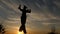 Stilt Walker Dancing at Sunset. Amazing Show. Action in Slow Motion.