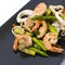 Stir fried asparagus with squid and shrimp with oyster sauce