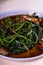 Stir fried Chinese spinach or po lun chai with garlic, soy sauce and a little chili