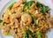 Stir fried instant noodle with seafood and Chinese kale