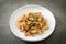 Stir-fried noodle with minced chicken and basil