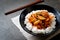 stir-fried pork with kimchi on topped rice