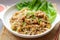 Stir fried rice noodles with chicken -  Thai food called Kuay Teow Kua Gai at close up view