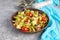 Stir fry farfalle pasta with vegetables, cauliflower and mushrooms