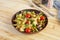 Stir fry farfalle pasta with vegetables, cauliflower and mushrooms