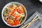 Stir fry with noodles, mushrooms and vegetables