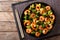 Stir frying shrimp with broccoli closeup. Horizontal top view