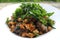 Stirfried pork with basil