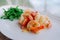 Stirfried shrimps with butter garlic and rocket salad