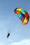 Stock image of parachuting over a sea, towing by a boat