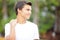 Stock image of a teen with hand on neck