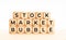 Stock market bubble words on wooden blocks