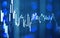 Stock market, candles and graph on a blue background with beautiful boke