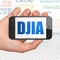 Stock market indexes concept: Hand Holding Smartphone with DJIA on display