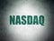 Stock market indexes concept: NASDAQ on Digital Data Paper background