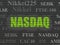 Stock market indexes concept: NASDAQ on wall background