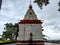 Stock photo of ancient Hindu temple of goddess renukadevi or tembalabai Devi. Temple building painted with white and red color,